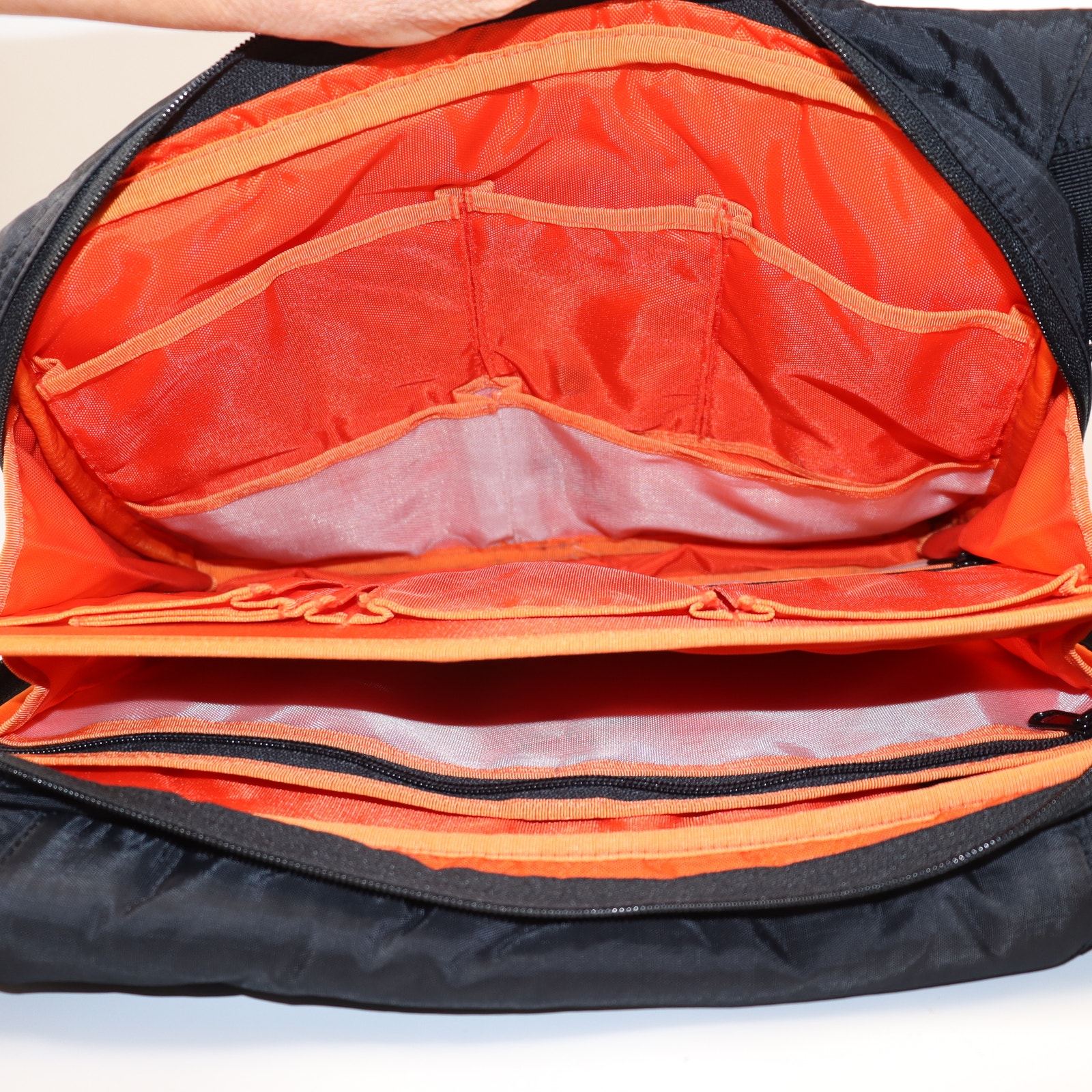Vintage Nomatic Black Nylon Messenger Bag With Bright Orange Interior — image 4 of 6